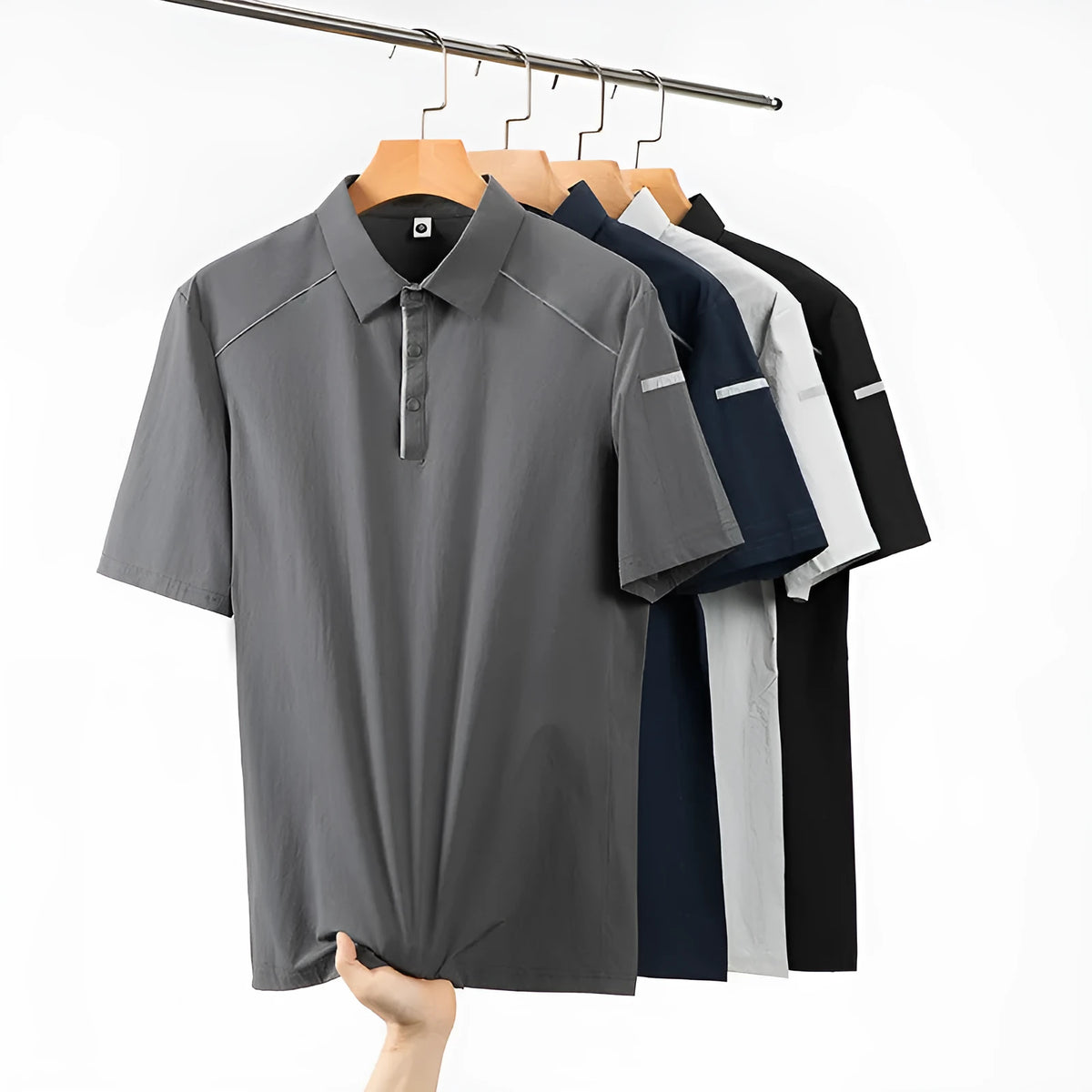 Man wearing a solid colour quick-dry polo shirt with short sleeves and a side slit detail.