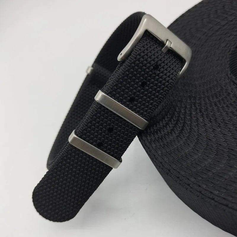 Integrated nylon watch strap in Army Green colour showing textile construction and attachment to watch lugs
