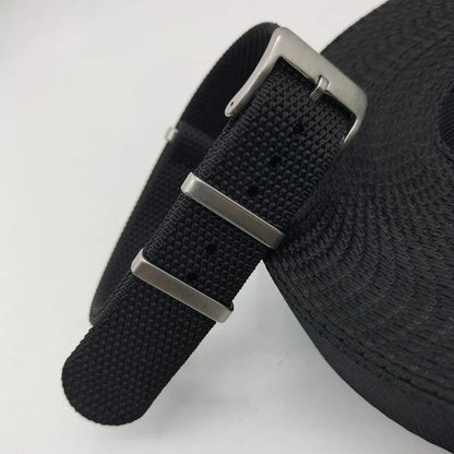 Integrated nylon watch strap in Army Green colour showing textile construction and attachment to watch lugs