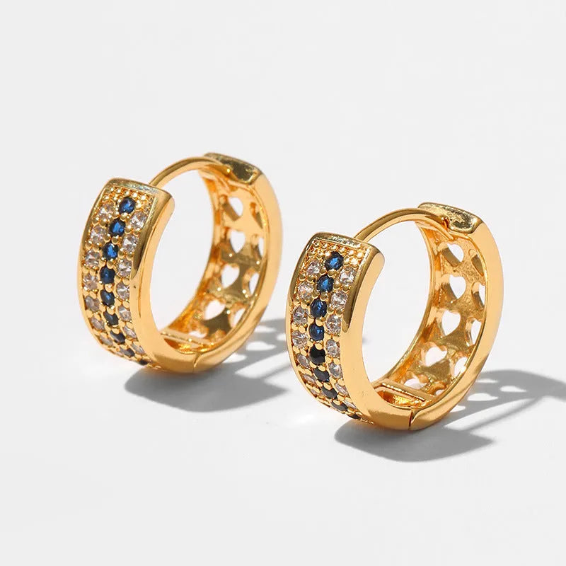 Round geometric women's earrings with 18K gold electroplated finish on copper, secure fastening