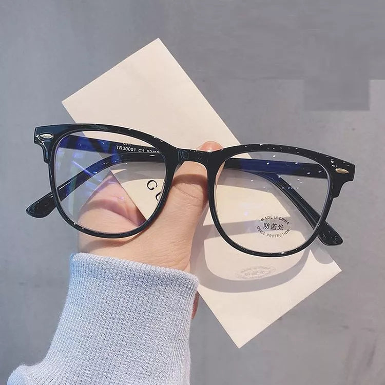 Retro Rivet Anti-blue Light Glasses in bright black, transparent green, gray, pink, and clear frames