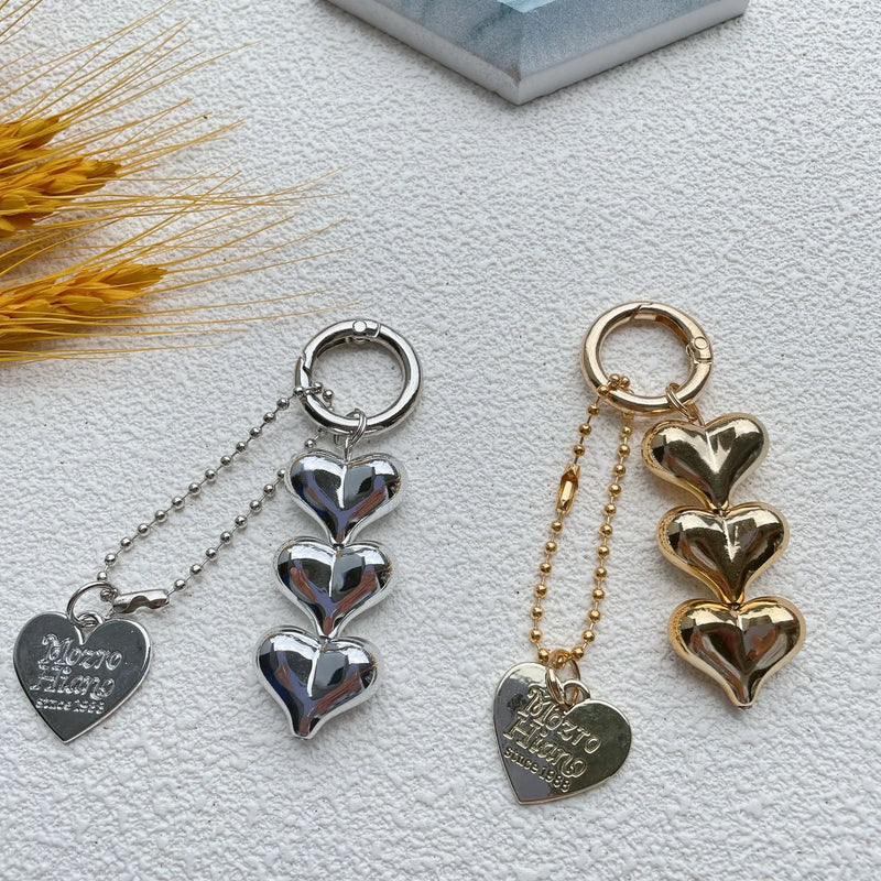 New Fart Peach Love Car Key Ring, acrylic keychain with electroplated metal decorative elements in black, gold, or white, featuring heart, water drop, or bell designs for personalised bag, luggage, or car key decoration.