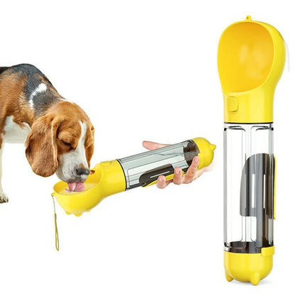 Aquamarine portable dog water bottle with attached poop bag dispenser and treat holder compartment