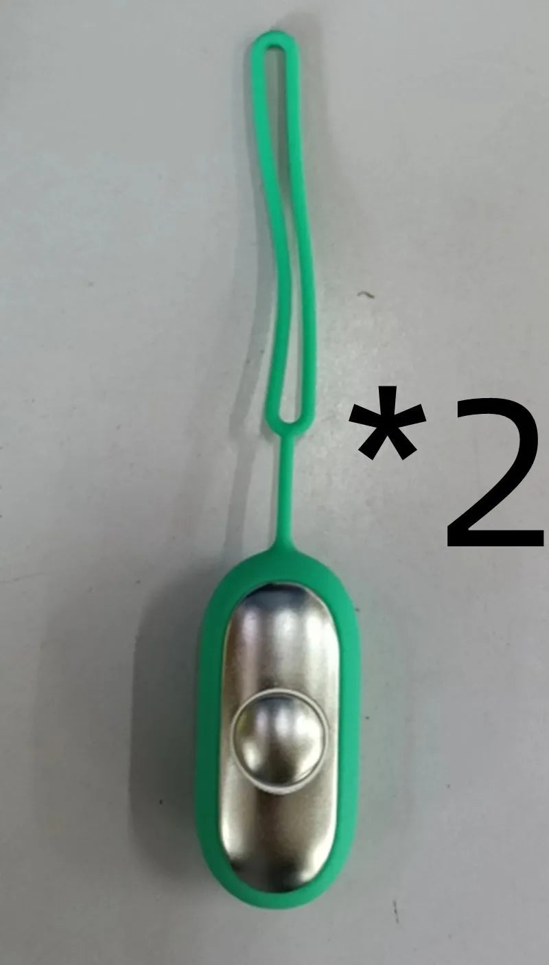 Hand-held micro-current sleep aid device in grey, green, and orange colour options