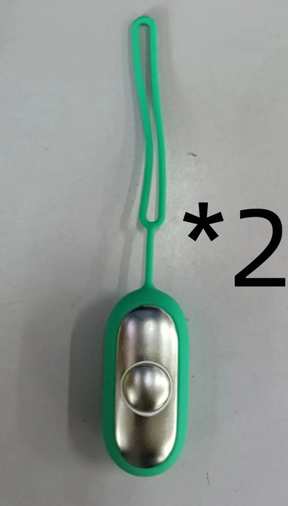 Hand-held micro-current sleep aid device in grey, green, and orange colour options