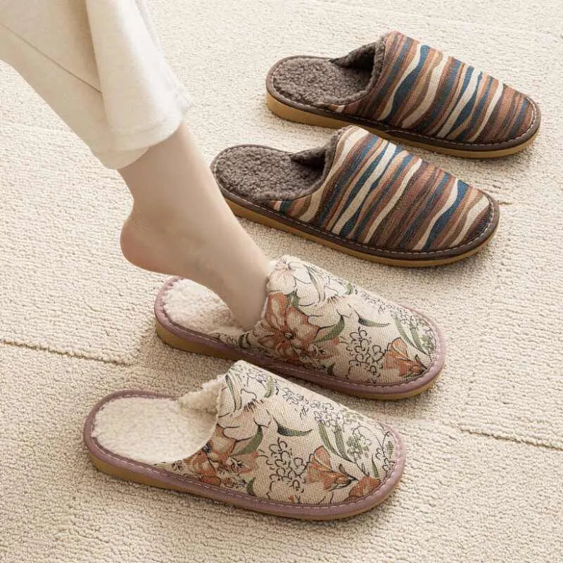 Pair of floral cotton slippers with linen-texture upper and light PVC sole for home wear.