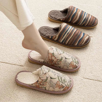 Pair of floral cotton slippers with linen-texture upper and light PVC sole for home wear.