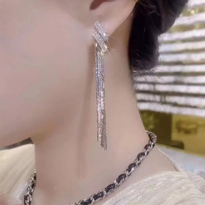 XINGX Water Drop Tassel Earrings in gold alloy with geometric design