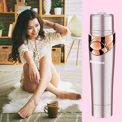 Four-in-one electric shaver in light fuchsia with USB charging cable and multiple cutter heads