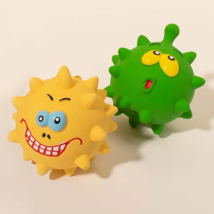 Four coloured natural latex dog balls with textured surfaces and cute faces, each measuring 7.5cm in diameter