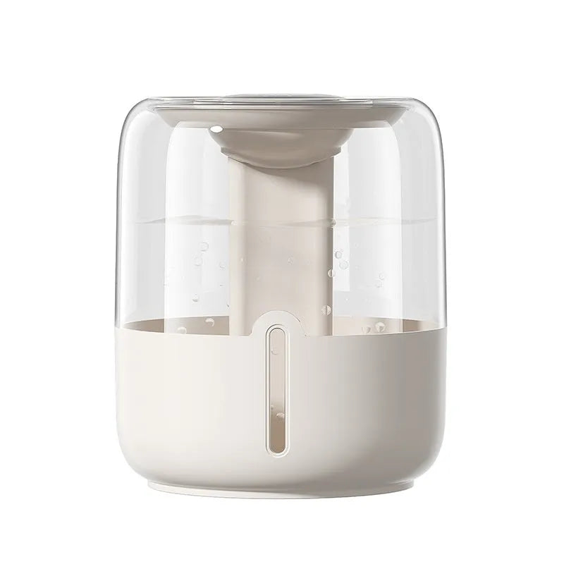 Beige round humidifier with dual spray nozzles, humidity display, and USB power connection