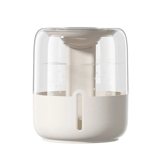 Beige round humidifier with dual spray nozzles, humidity display, and USB power connection