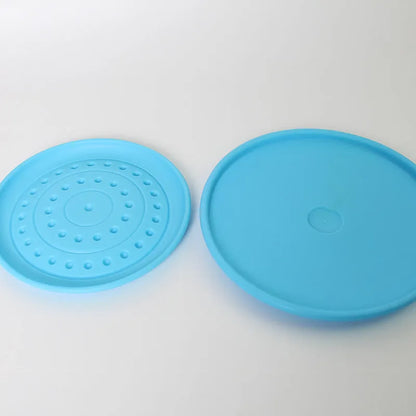 Rubber dog frisbee plastic pet toy in small and large sizes with multiple colour options