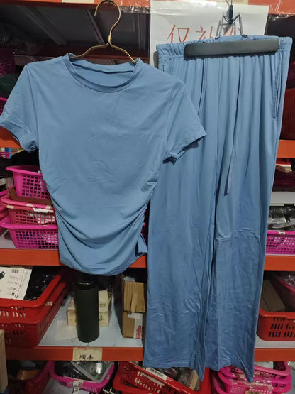 Women's 2-piece solid color yoga set with short-sleeve top and high-waisted pants