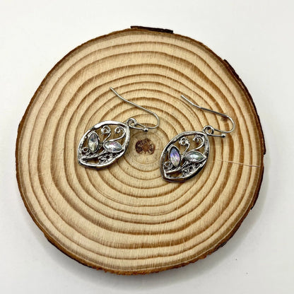 Silver alloy leaf-shaped women's earrings with embedded blue-grey moonstones and a butterfly clasp.