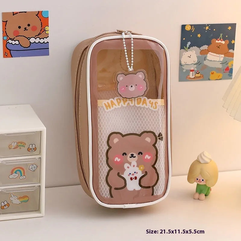 Transparent PVC pencil case with cartoon bear design showing pens inside