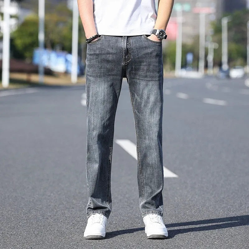 Men's tapered trousers in stretch cotton denim fabric for business casual wear