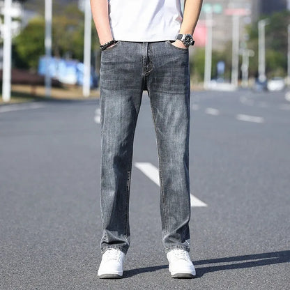 Men's tapered trousers in stretch cotton denim fabric for business casual wear
