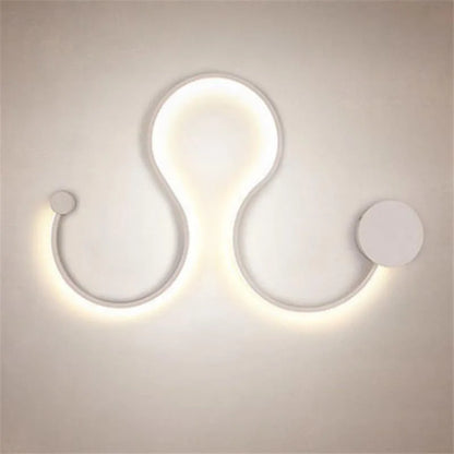 Modern black and white LED wall lamp with aluminium shade in four different sizes for bedside or corridor lighting