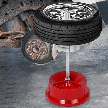 Portable hub balancer with aluminium head, bull's eye level, and 11.5" diameter base for wheel balancing
