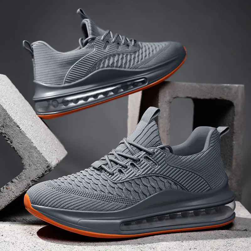 Men's black low-top mesh running shoes with lace-up front and platform sole.
