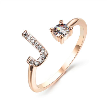 Personalized Initial Letter Adjustable Ring made of copper alloy and zircon, showcasing a vintage-inspired design