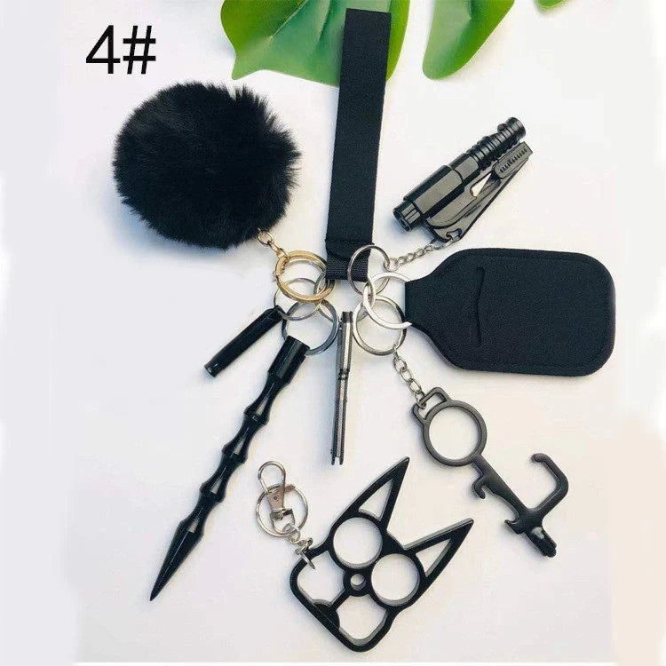 Self-defense keychain set for women with 11 safety tools including alarm and window breaker