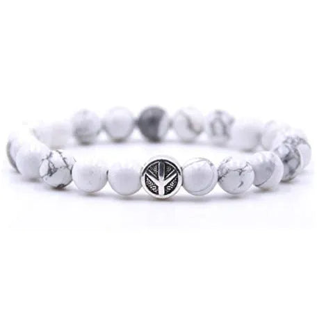 Handcrafted natural stone bracelet with alloy volcano white turquoise charm in a simple design.
