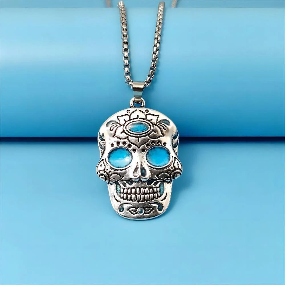 Glowing Halloween skull necklace with intricate Day of the Dead lotus pattern and vibrant color options