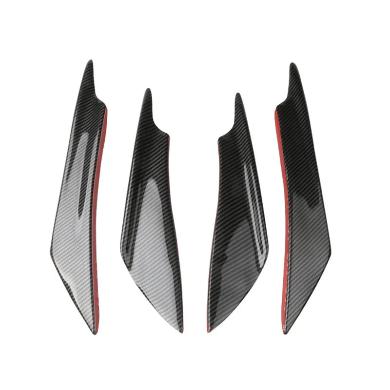 Set of four carbon fibre pattern ABS plastic bumper blades for car modification.