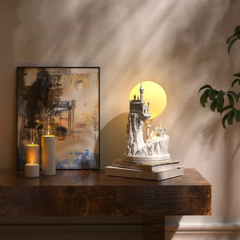 White composite gypsum desk lamp with a wire control switch on a table.