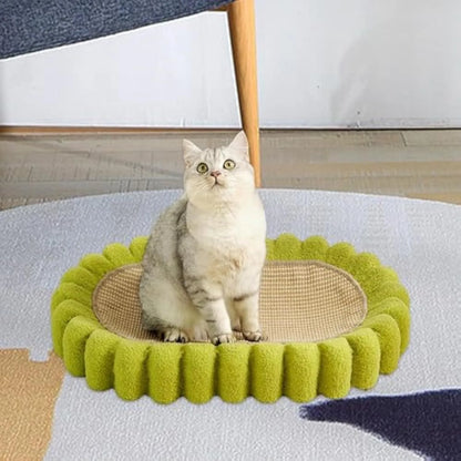 Green oval-shaped sisal cat scratching pad with a central bowl, serving as a cat bed and furniture protector.