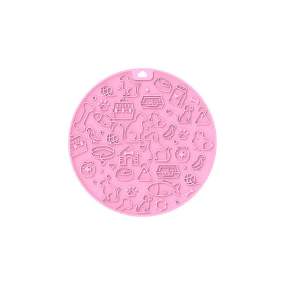 Round blue silicone pet licking mat with textured surface and suction base for slow feeding
