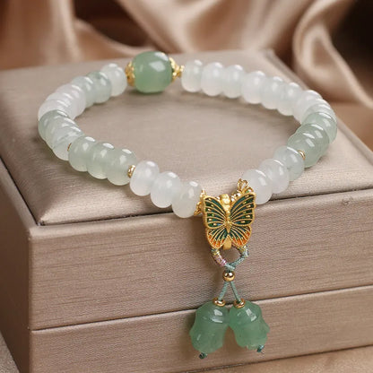Green Tian Shan Cui jade abacus beads bracelet with retro butterfly tassel and crystal decoration
