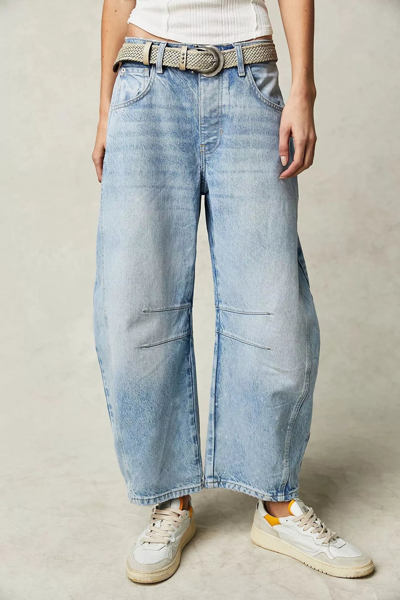 Women's mid-rise barrel jeans with wide leg design in various colors