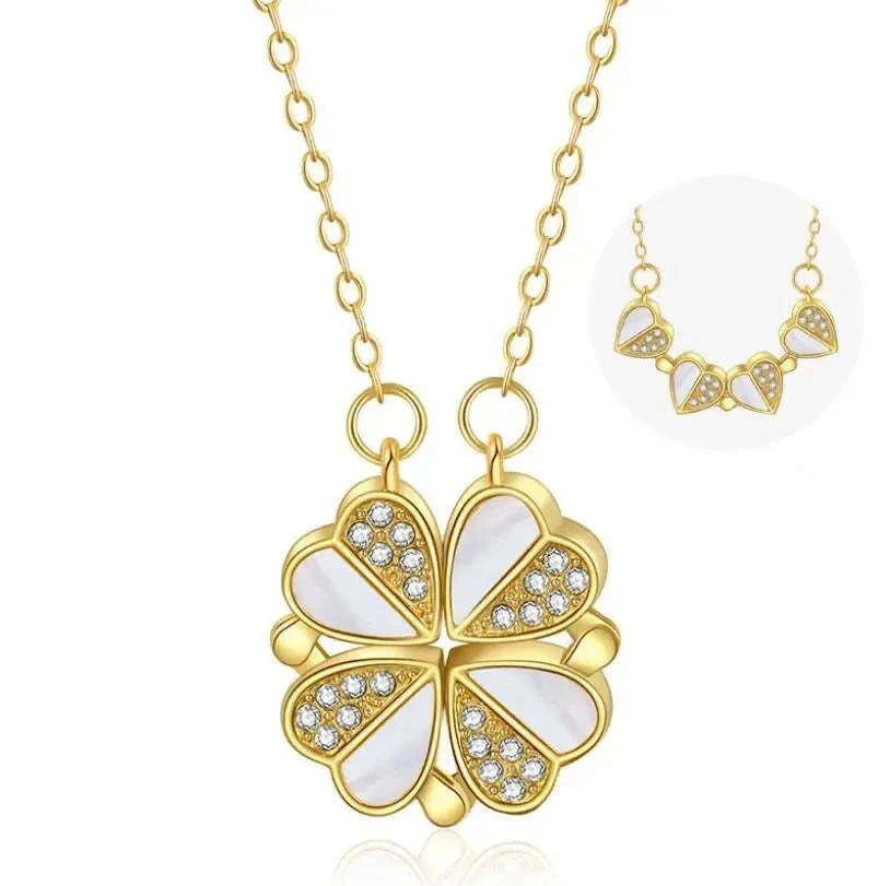 Elegant four-leaf clover pendant necklace with sparkling crystal heart detail, made of premium stainless steel for women's fashion jewelry gift