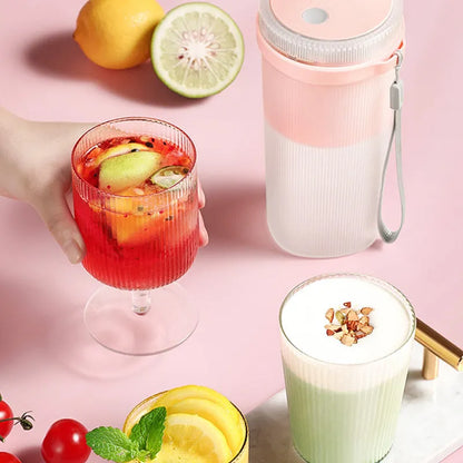 Portable USB rechargeable blender cup in blue, green, or pink with 300ml capacity and detachable blades