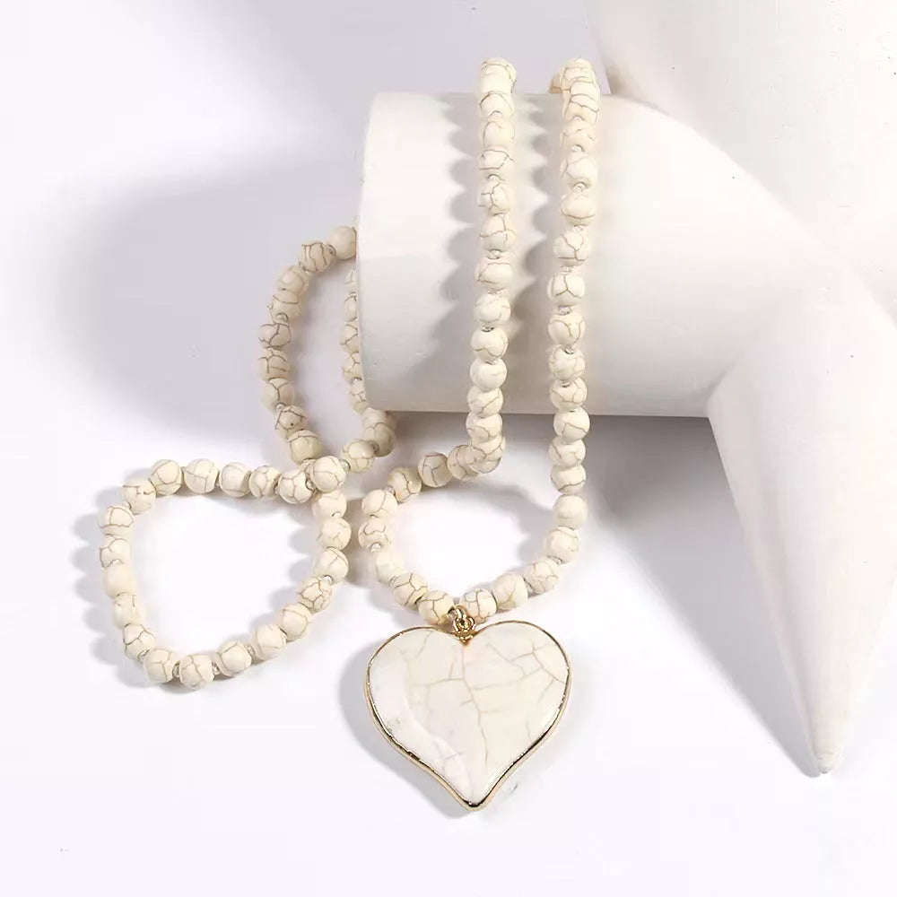 Handmade vintage ethnic style necklace with heart-shaped Mother Pearl pendant and turquoise beads