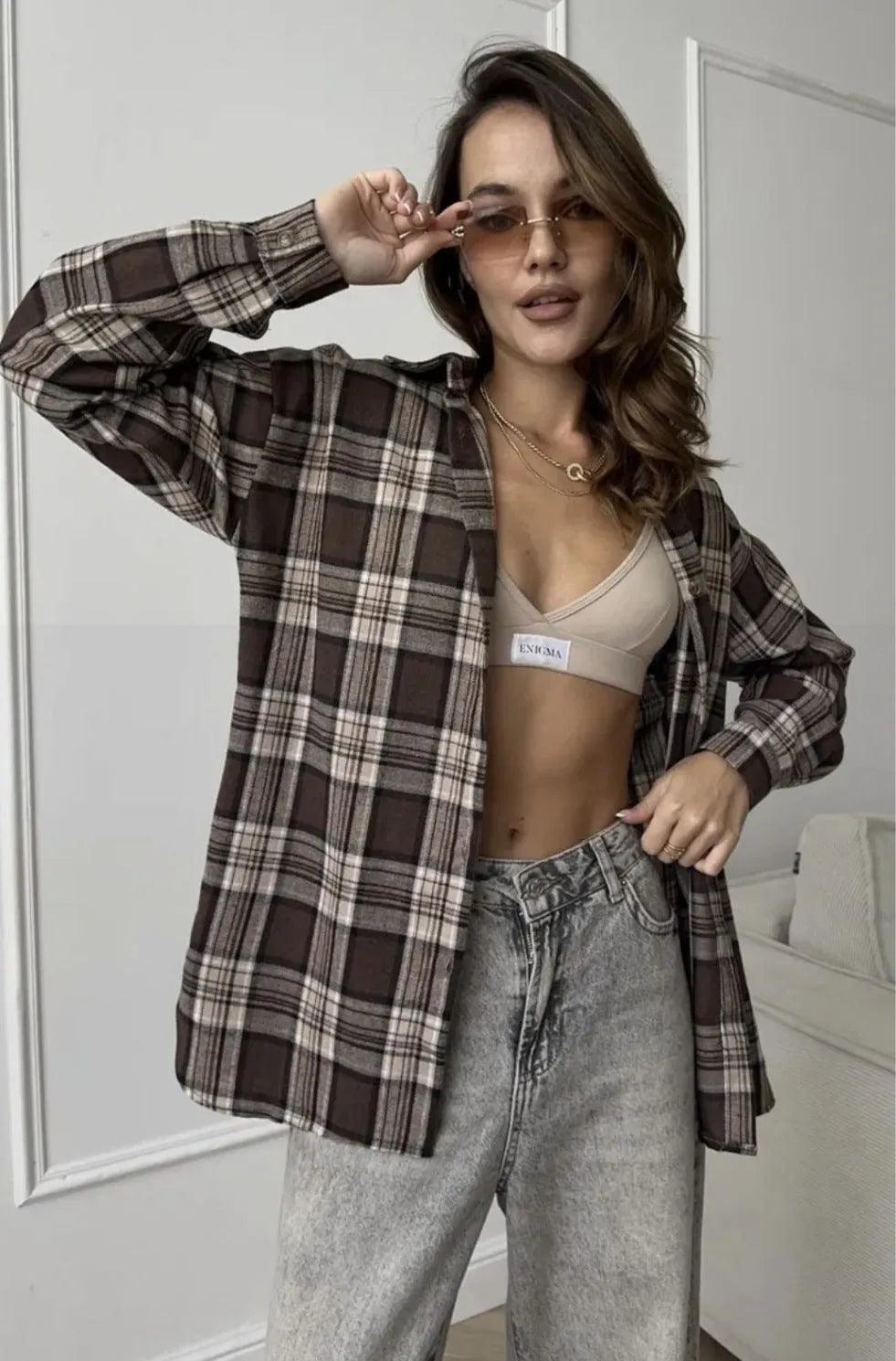 Dark brown retro striped women's long sleeve shirt with a collar and button-up front.