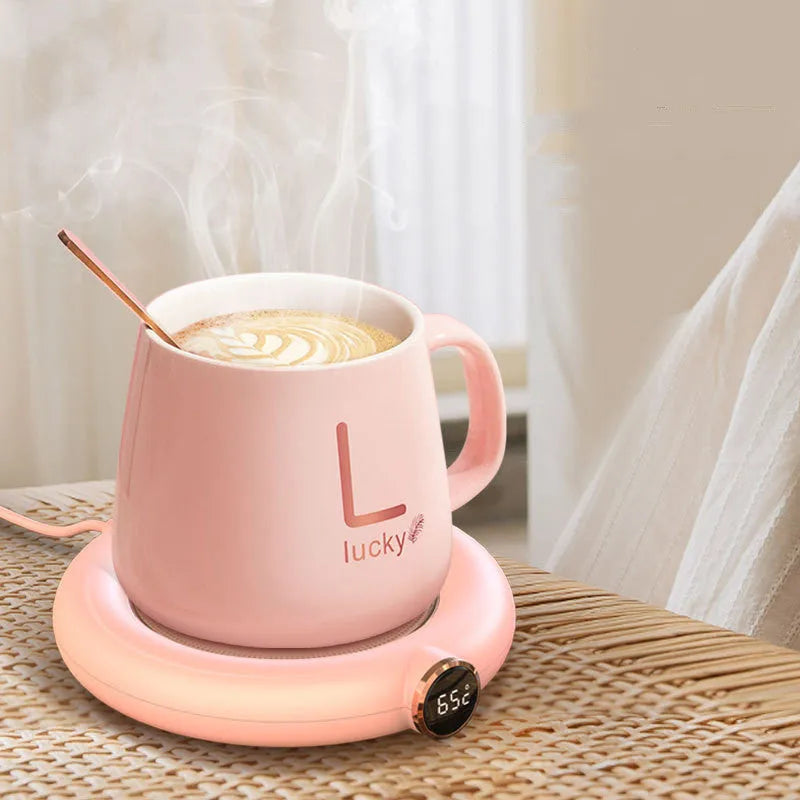 White USB coffee mug warmer heating pad on wooden desk
