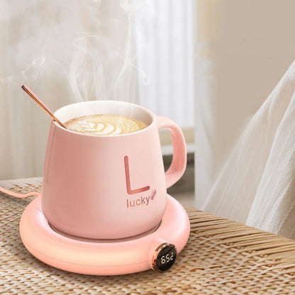 White USB coffee mug warmer heating pad on wooden desk