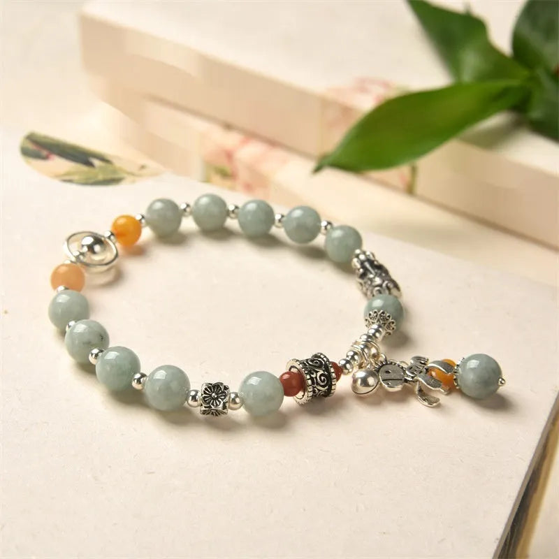 Natural jade and alloy vintage bracelet with retro style and pony bracelet design
