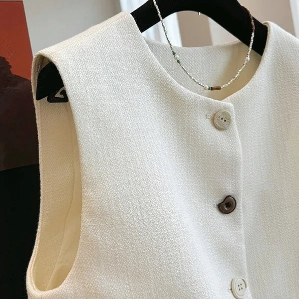 Women's round-neck sleeveless bandage vest in milky white, shown on a model.