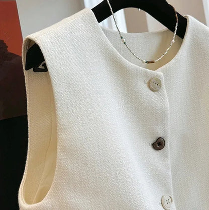 Women's round-neck sleeveless bandage vest in milky white, shown on a model.