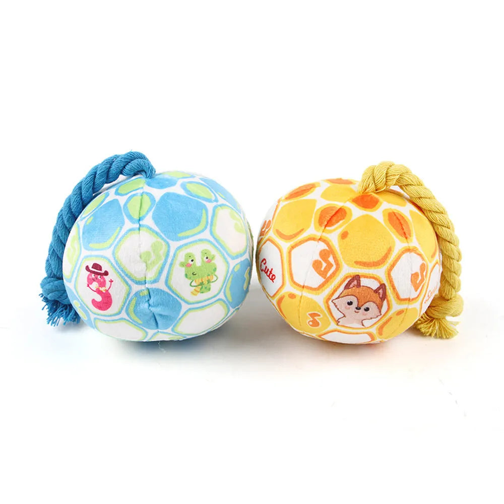 Blue and yellow elastic football dog toy with an attached cotton rope for tug of war and chewing.