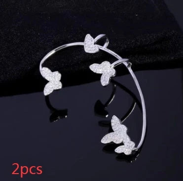 Stylish butterfly ear clips with sparkling zircon stones in gold and silver finishes