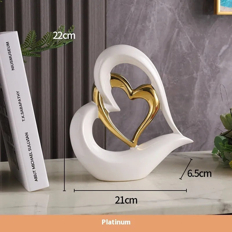 Modern geometric heart ornament in white porcelain with metallic colour finish options