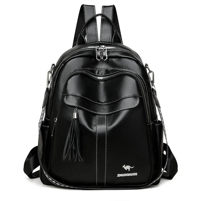 Genuine leather tassel backpack in khaki, black or brown with anti-theft pockets for casual travel