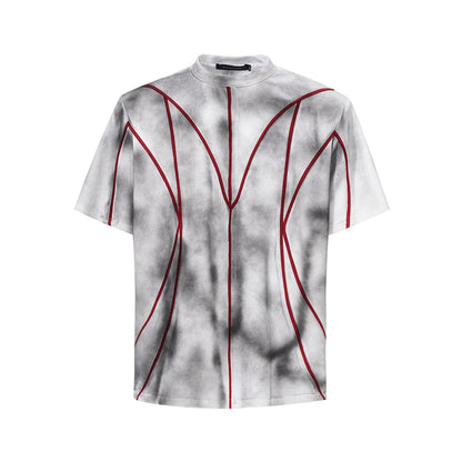 Padded shoulder short sleeve t-shirt with raised 3D line patchwork detailing on the front.