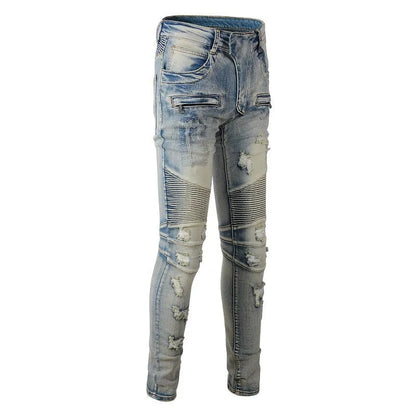Light blue men's distressed slim jeans with hand-frayed detailing and straight leg cut